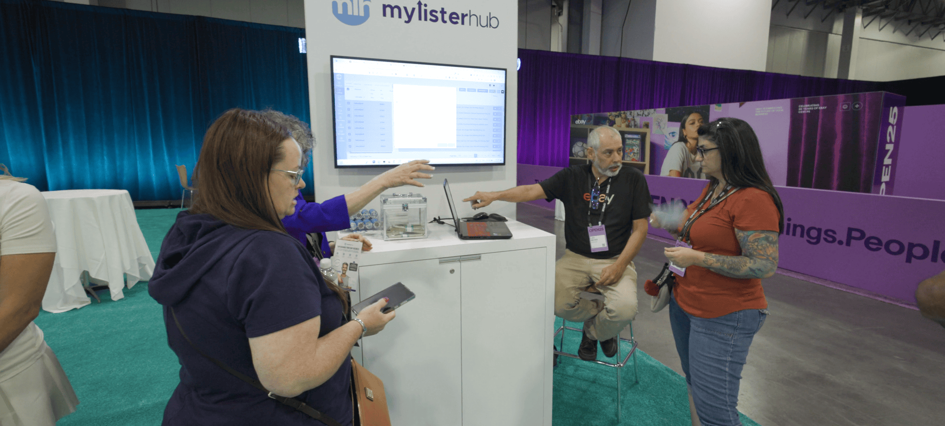 MyListerHub team demonstrating listing automation software to eBay sellers during eBay Open 2025 in Las Vegas