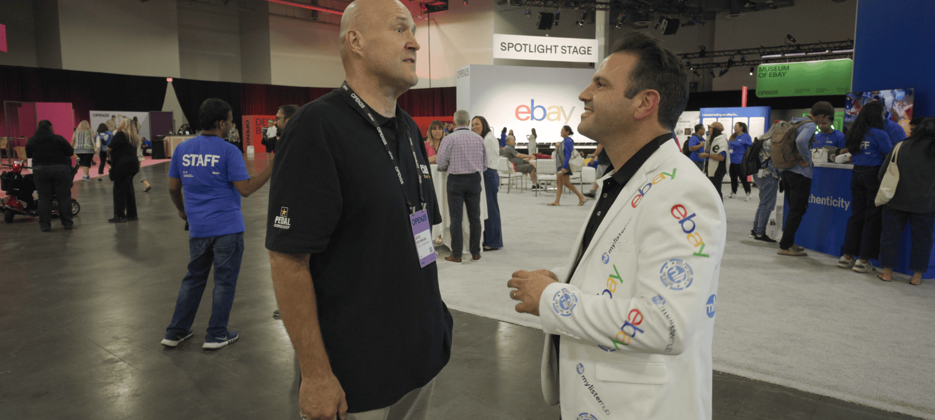 MyListerHub agent speaking with attendees at eBay Open 2025 near the Spotlight Stage